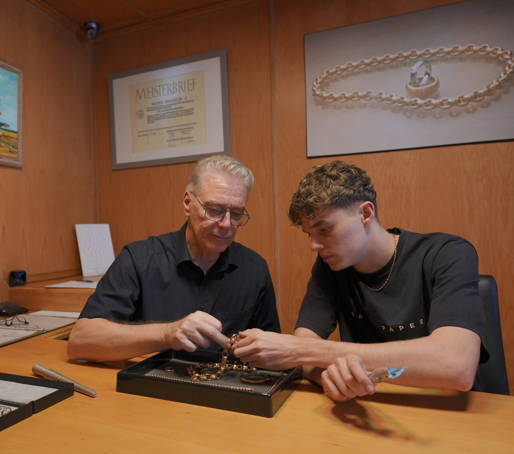 Bernd and his son in the showroom